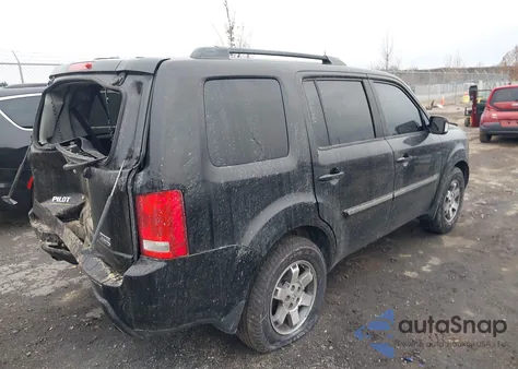 2011 Honda Pilot Touring z USA, uszkodzony, nr VIN 5FNYF4H98BB091907